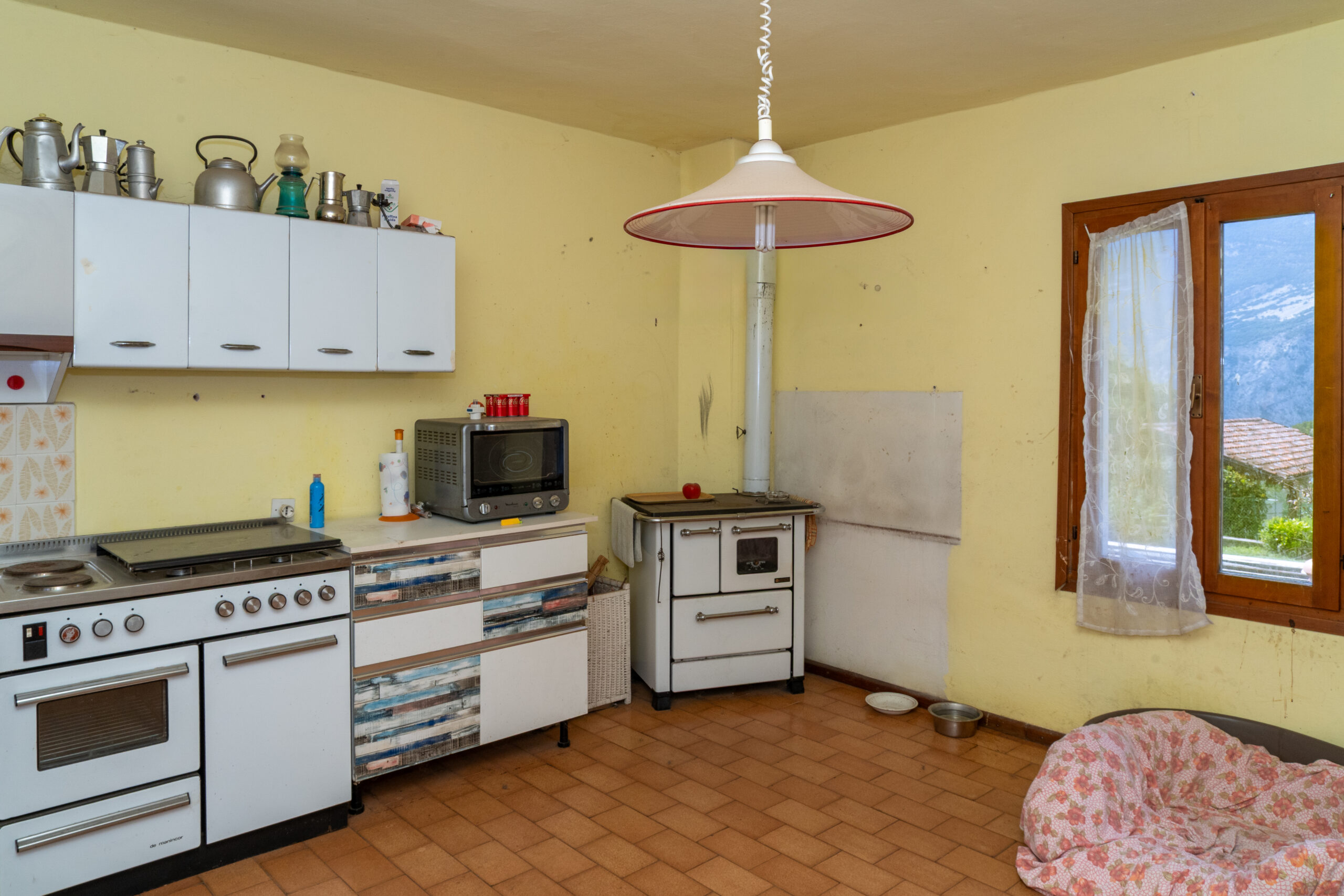 Porzione di casa a Drena con giardino e vista castello 